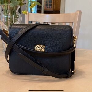 SOLD 🌼 Coach Cassie 19